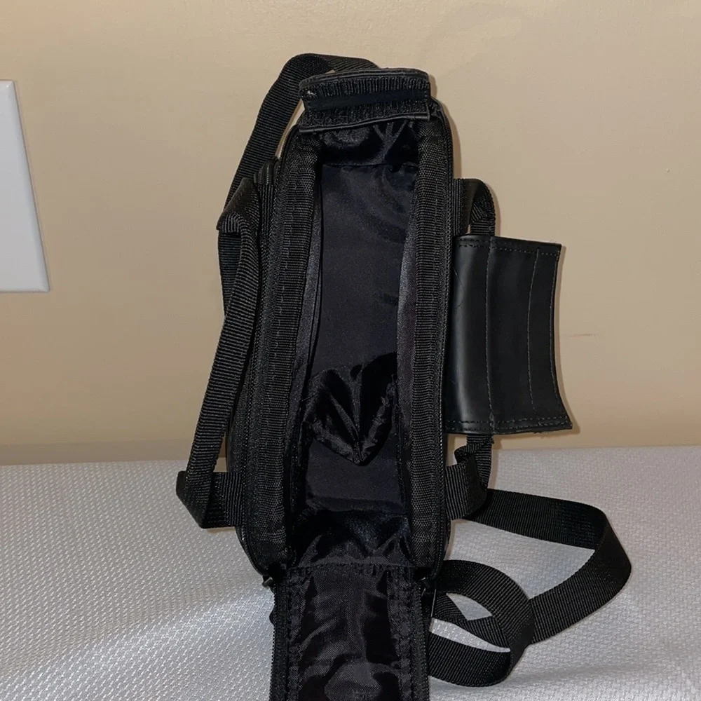 Canon camera bag black carrying case travel padded zipper pockets strap handle